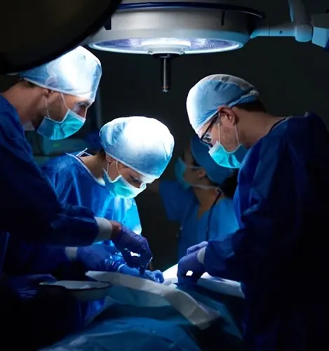 Surgical team using wound-closure sutures in the operating theatre